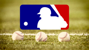 Major League Baseball logo on grass