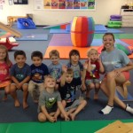 New owner, Amber Money, with Gymboree students